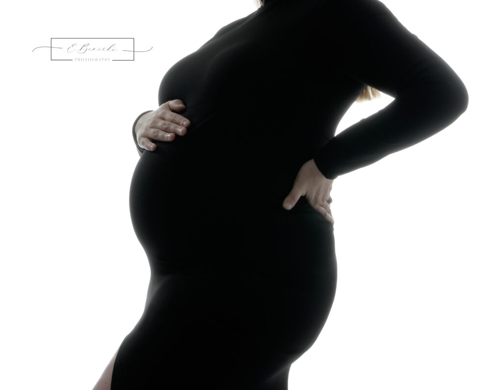 Seattle mom to be embracing the idea of wearing a fitted outfit for her pregnancy photoshoot.