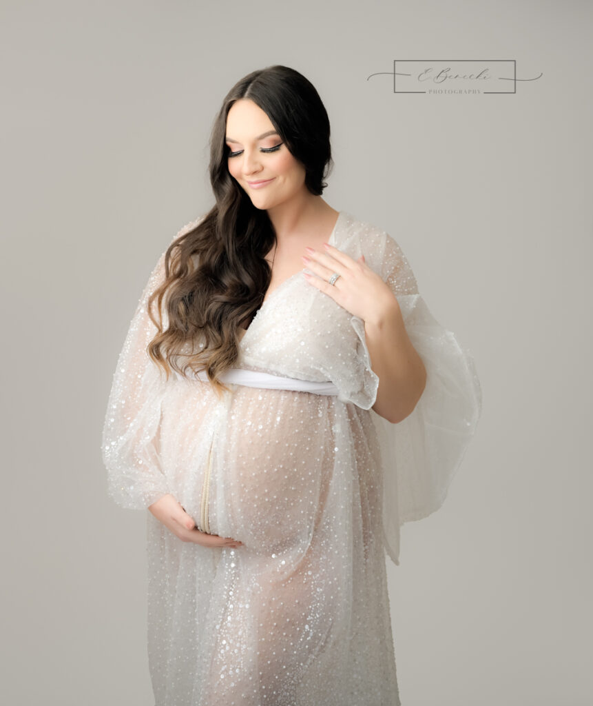 Beaded, sequin pregnancy outfit from E. Benecki Photography's client closet, worn by Mom to be for her pregnancy photoshoot.